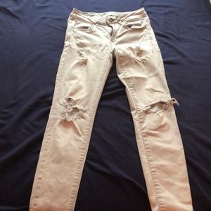 Light gray ripped American Eagle Jeans for women